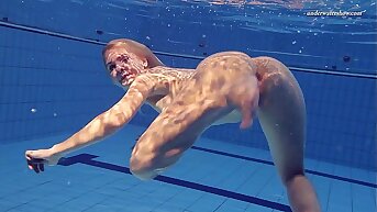 Hot Elena shows what she buttocks do under water